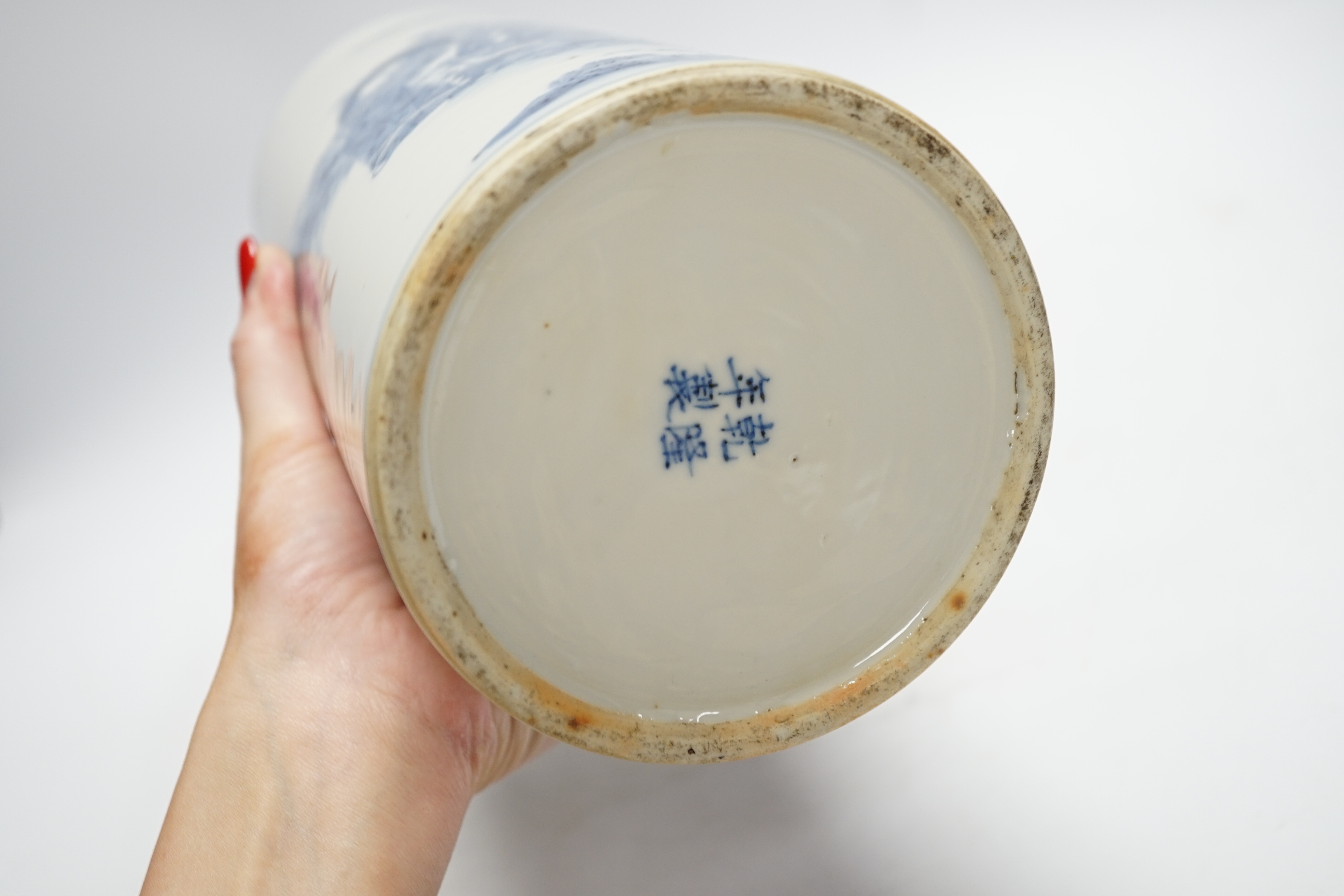 A Chinese blue and white ‘sages’ cylindrical brushpot, 19th century